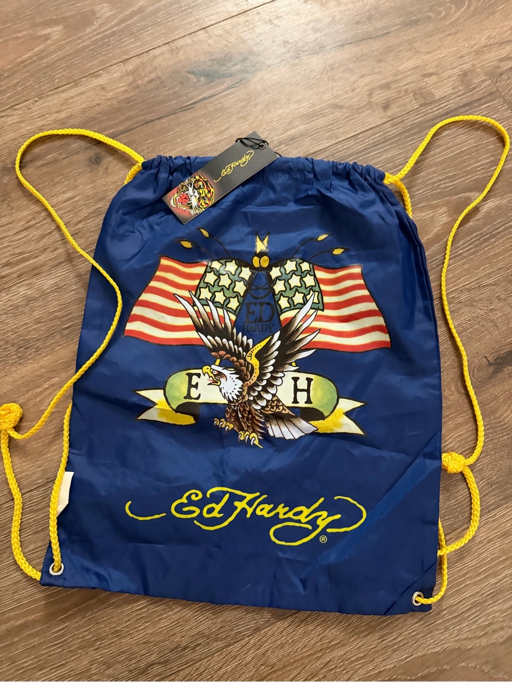 Ed Hardy Navy and Yellow Drawstring Backpack with Eagle Flag Graphic